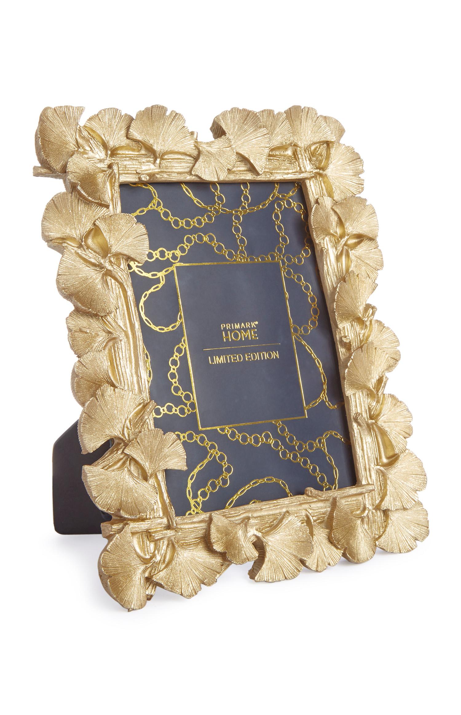 Cornice oro Art Déco con nappine