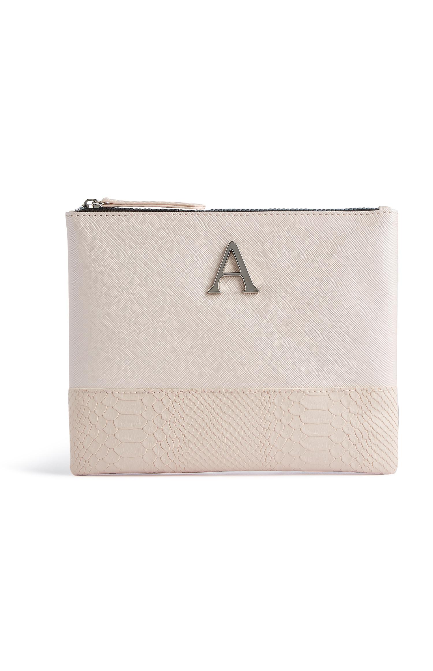 Trousse color carne con iniziale