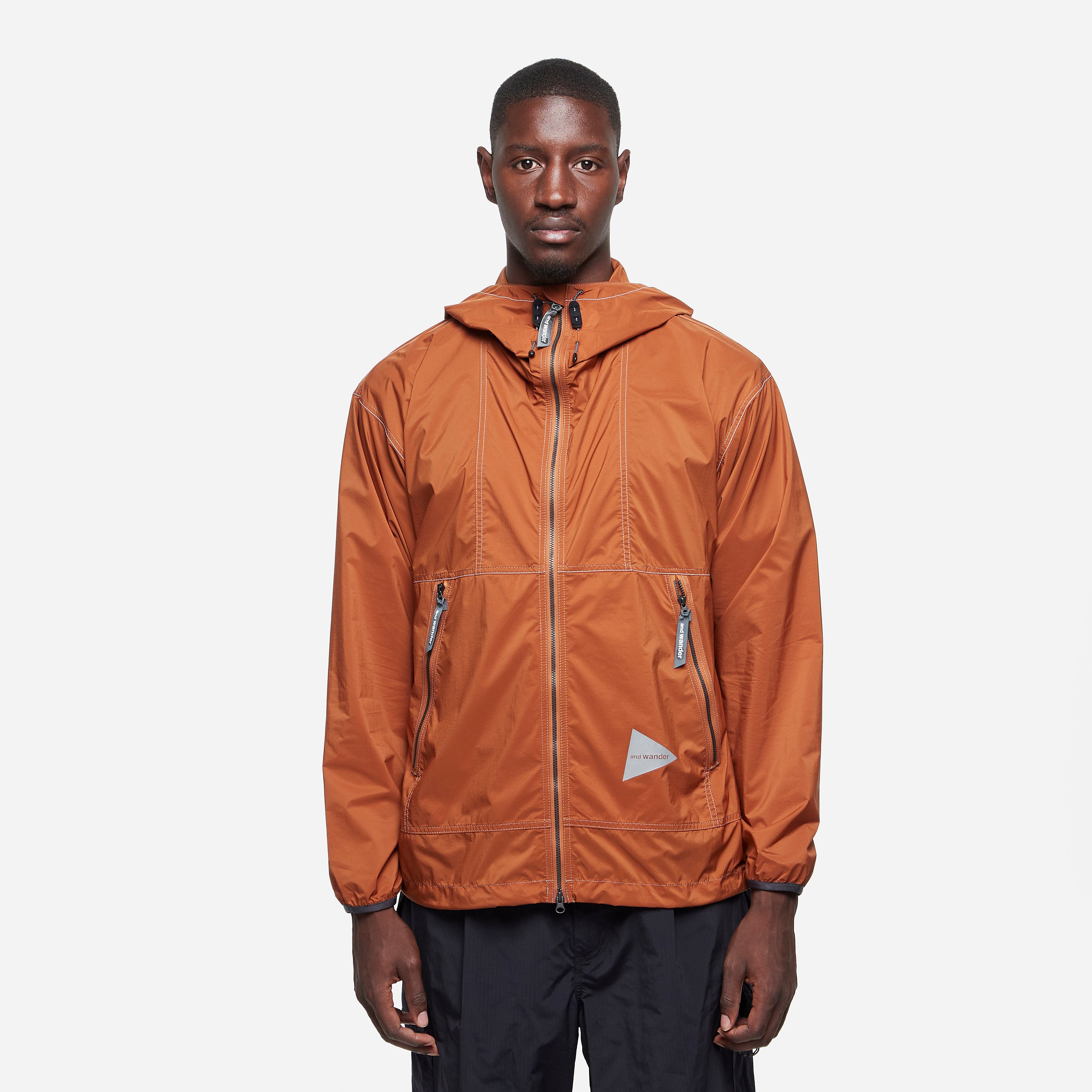and wander PERTEX Wind Jacket, Orange - Curated Menswear
