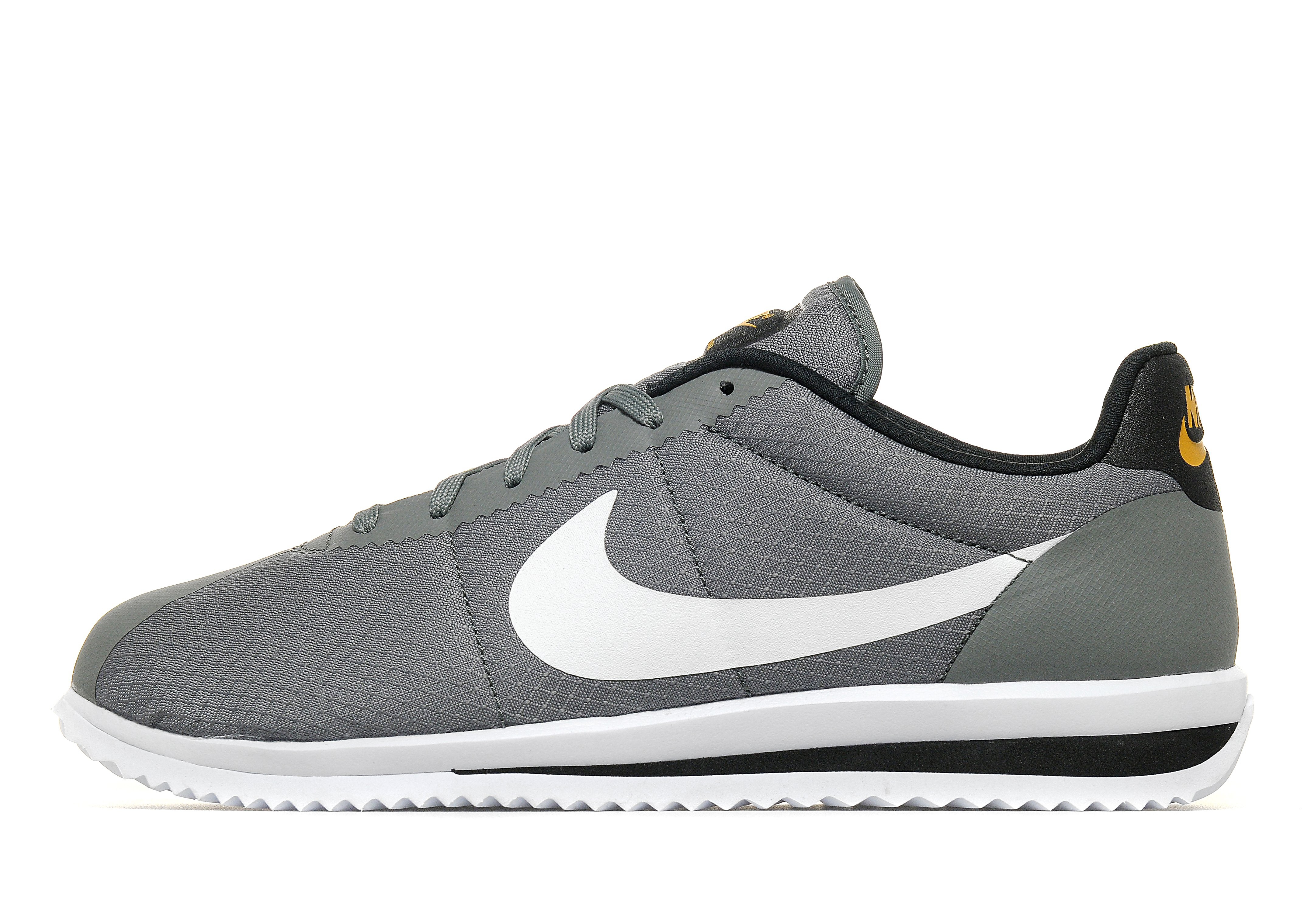 grey nike cortez mens