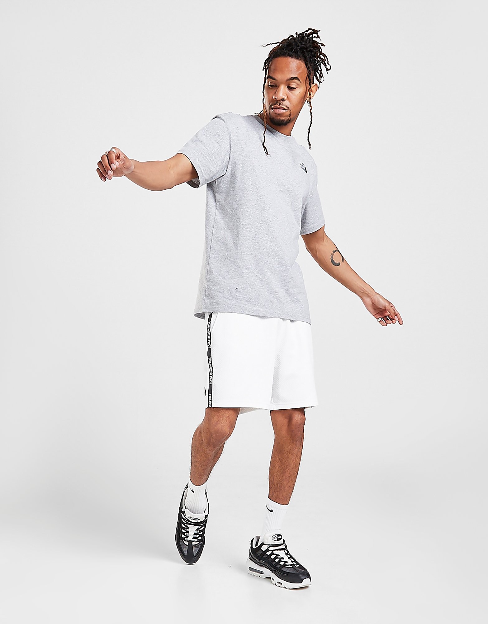 The north face train n logo shorts best sale