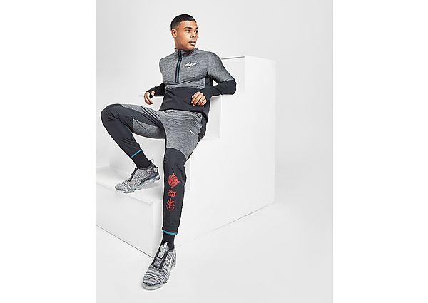 Nike Haut de running à demi-zip et motif Nike Dri-FIT Wild Run pour Homme - Iron Grey/Black/Heather,