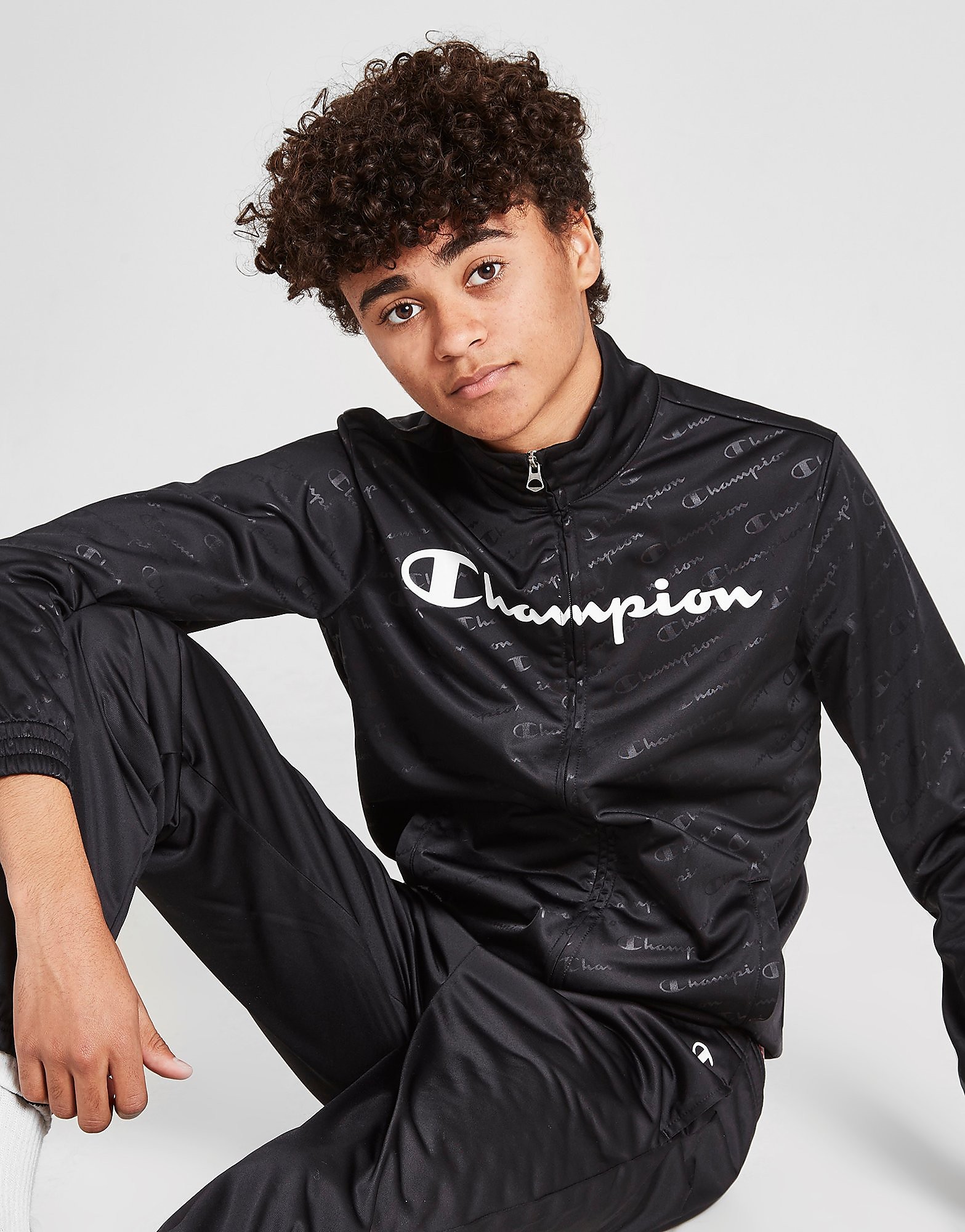 

Champion All Over Poly Tracksuit Junior - Black/Black - Kids, Black/Black