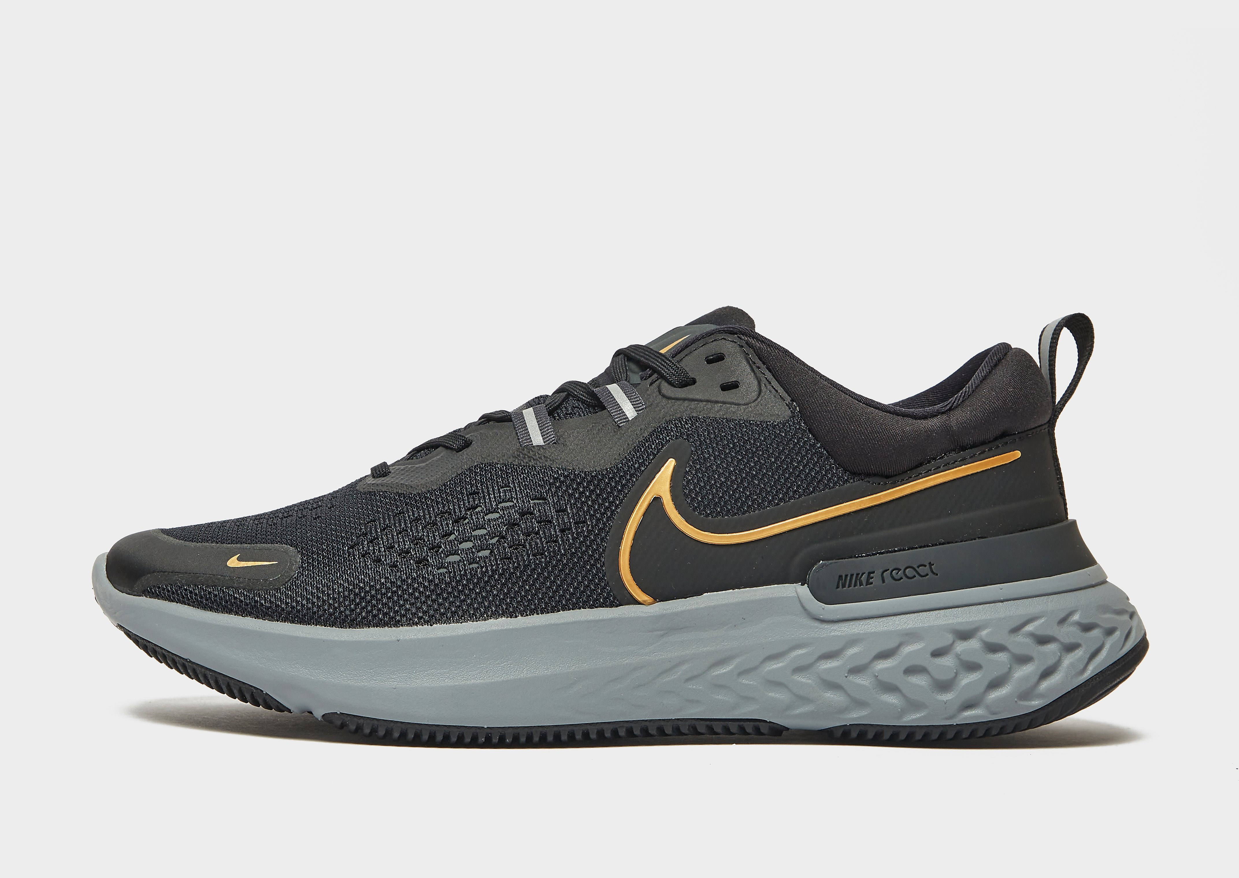 

Nike React Miler 2 - Black/Dark Smoke Grey/Particle Grey/Metallic Gold - Mens, Black/Dark Smoke Grey/Particle Grey/Metallic Gold