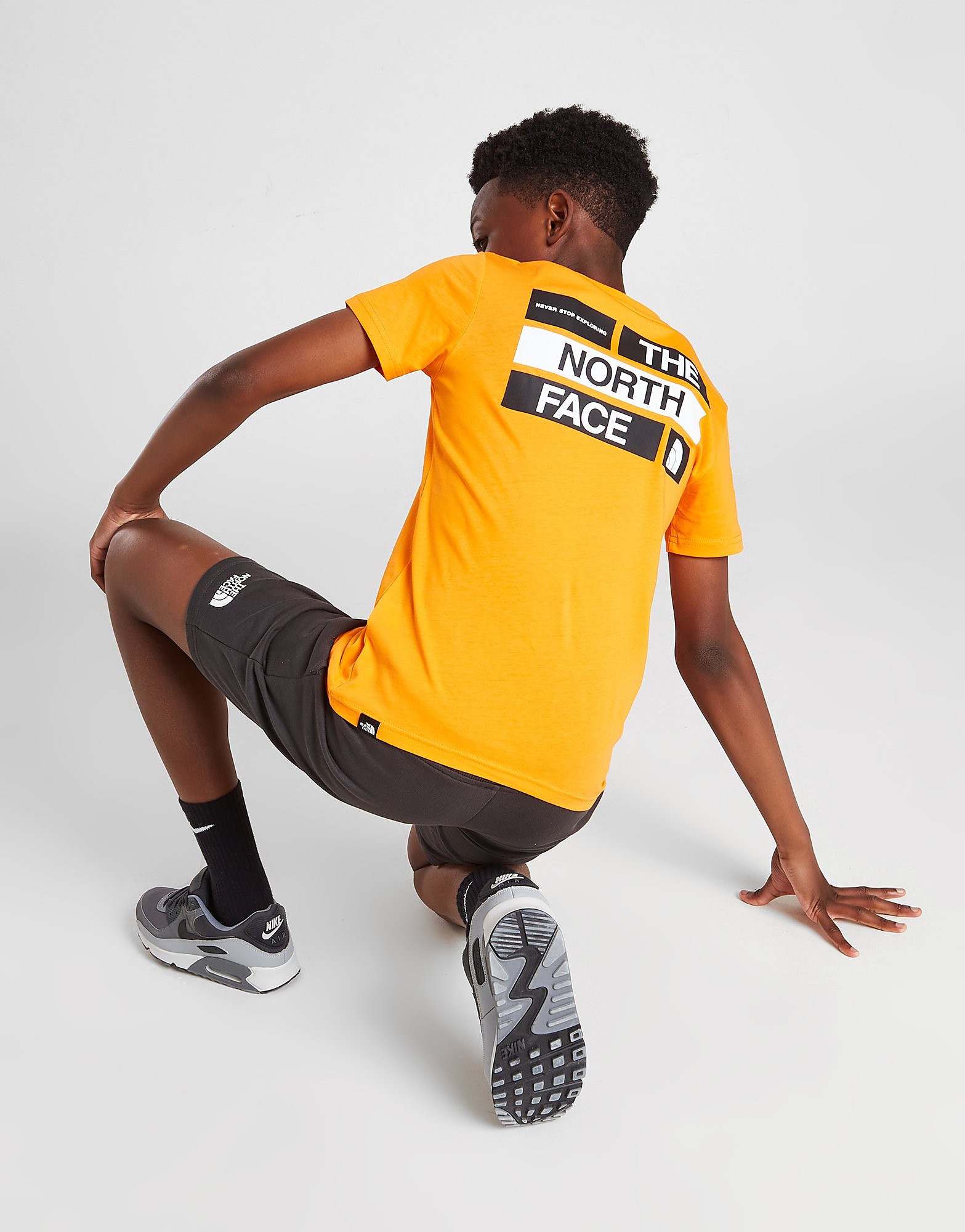 

The North Face Back Graphic Short Sleeve T-Shirt Junior - Only at JD - Orange - Kids, Orange