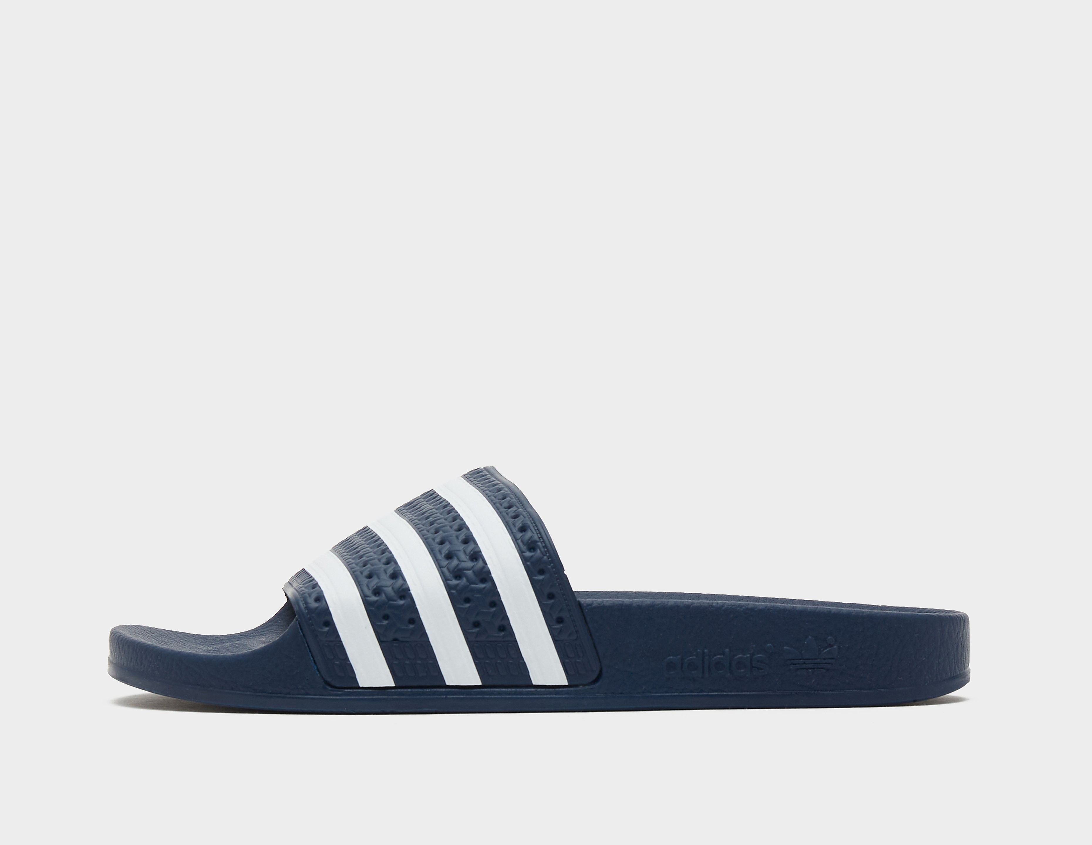 adidas Originals Chanclas Adilette Slides para mujer, azul