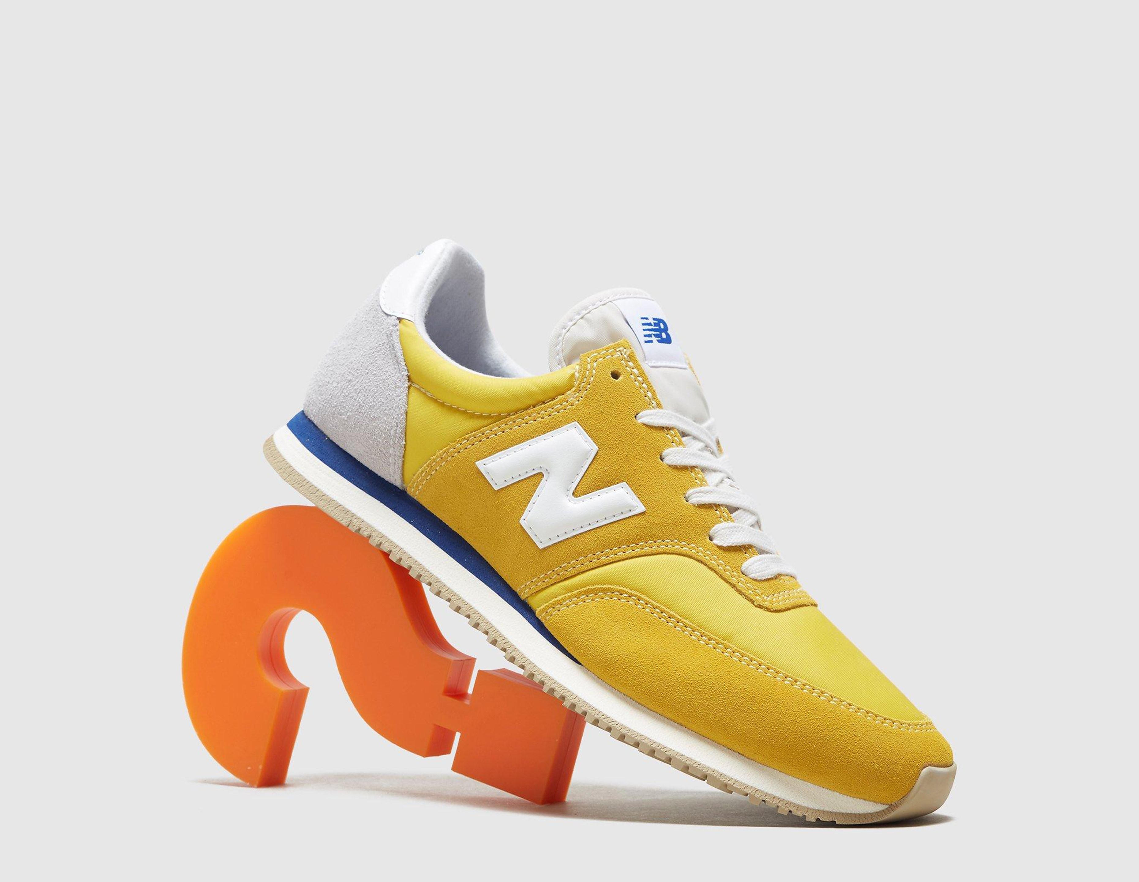 New Balance Comp 100, jaune